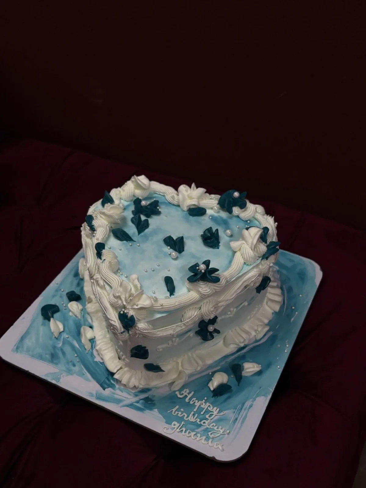 Blue and white heart birthday cake with piped ruffles